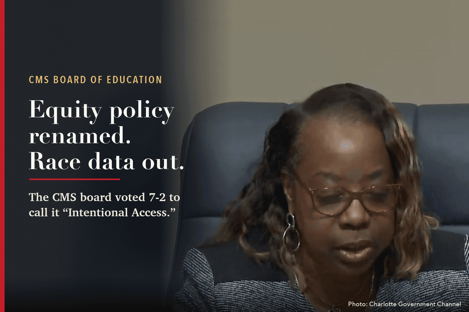 Board member Lenora Shipp reads a motion at the CMS board dais, beside the words: Equity policy renamed. Race data out. The CMS board voted 7-2 to call it Intentional Access.